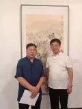 在河南省18届画展上，画家蔡元甫与郑州市美术家协会副主席丁万春先生合影